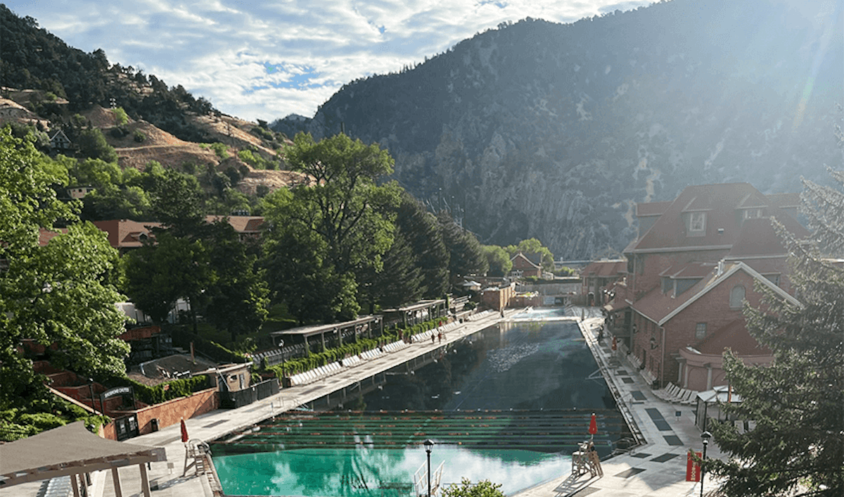 A swimming pool in the middle of a mountain.
