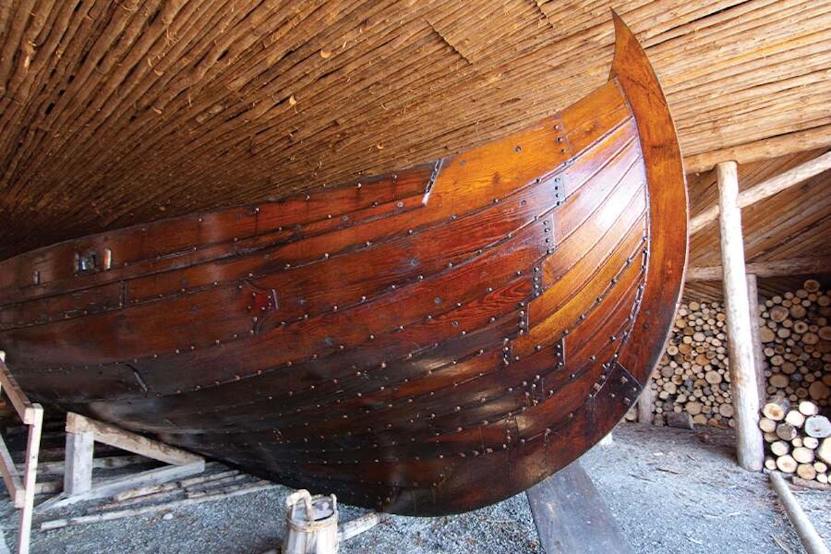 Viking ship in a wooden shed.