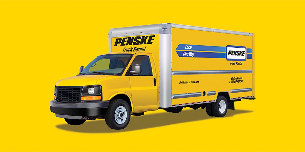 A yellow moving truck on a yellow background.