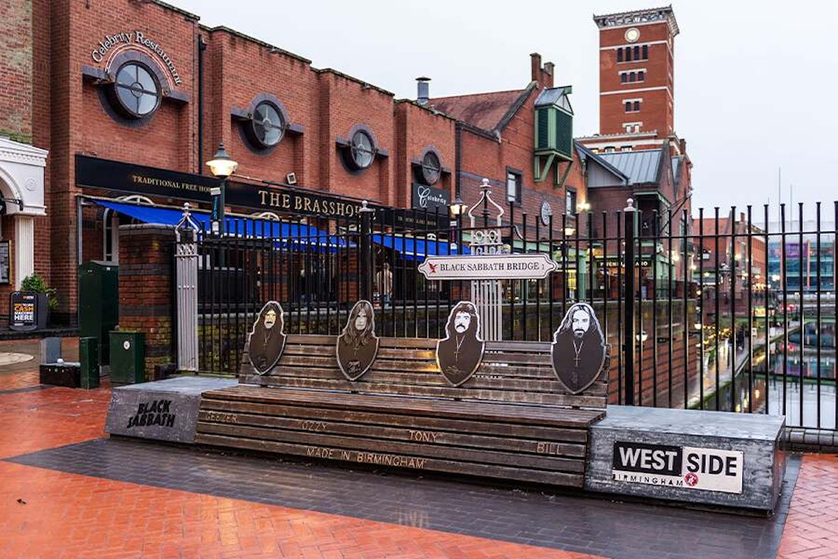 The entrance to the brasshouse with a tribute to black sabbath on broad street in birmingham, near the canal, with overcast skies.