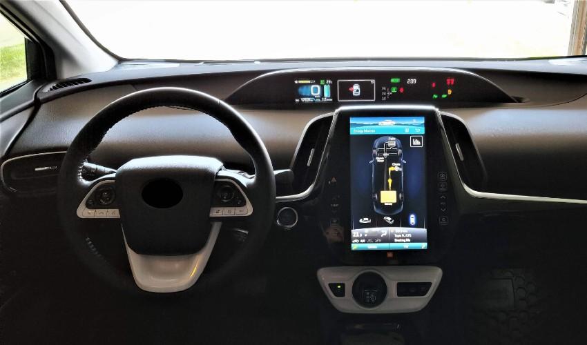 The dashboard and steering wheel of a car.