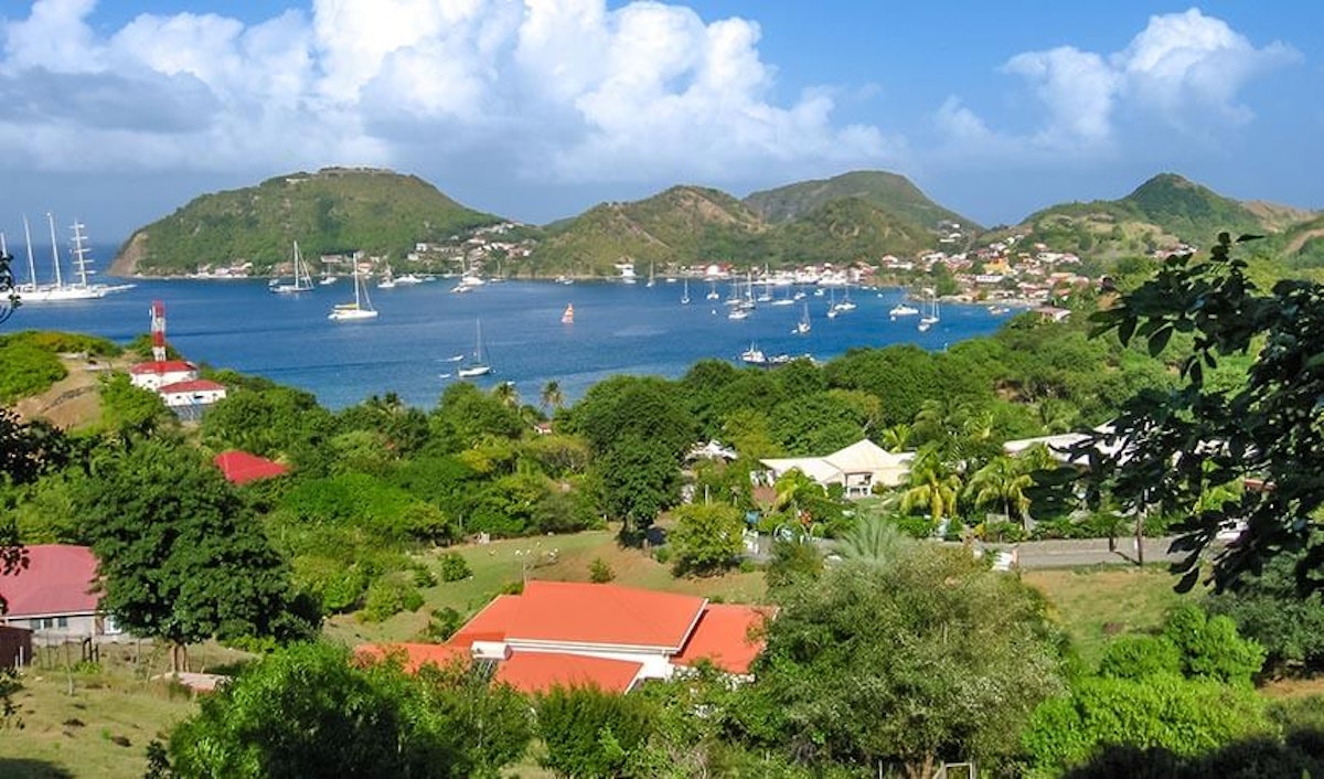 A view of st lucia from a hill overlooking a bay.