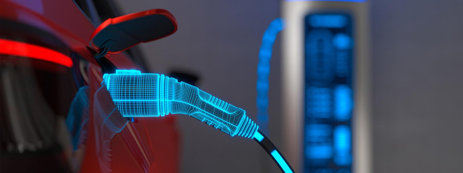 A red electric vehicle port holds a charger that glows light blue, signifying that there is a current is running through it.