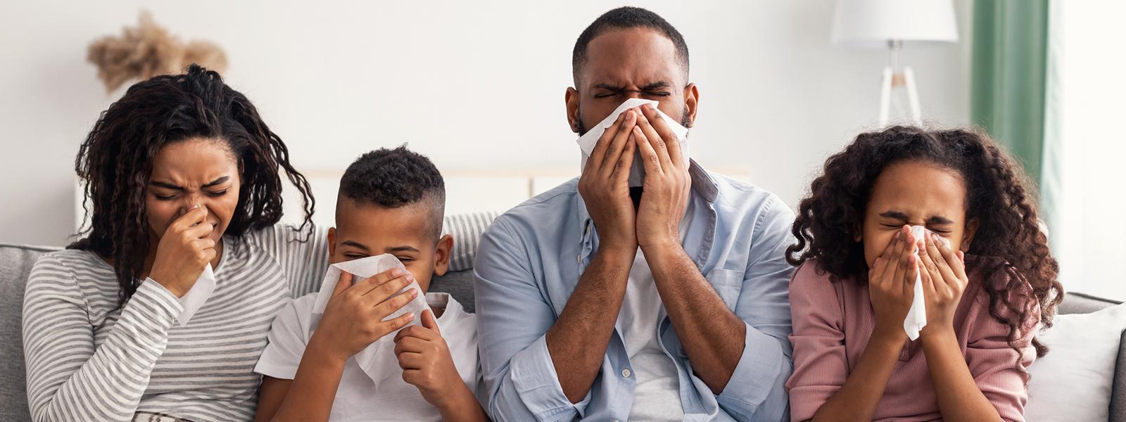 Four people sitting sick with a flu