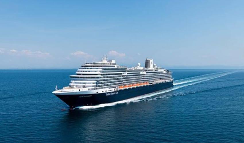 A large cruise ship sailing in the ocean.