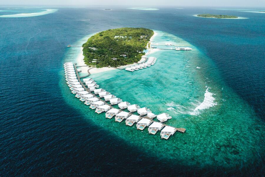 An aerial view of an island in the middle of the ocean.