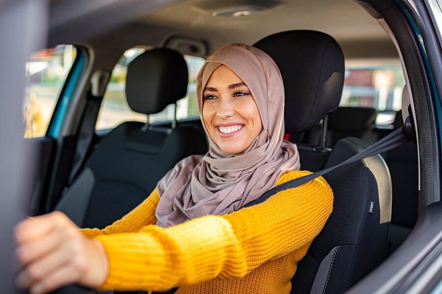 A woman in a car.